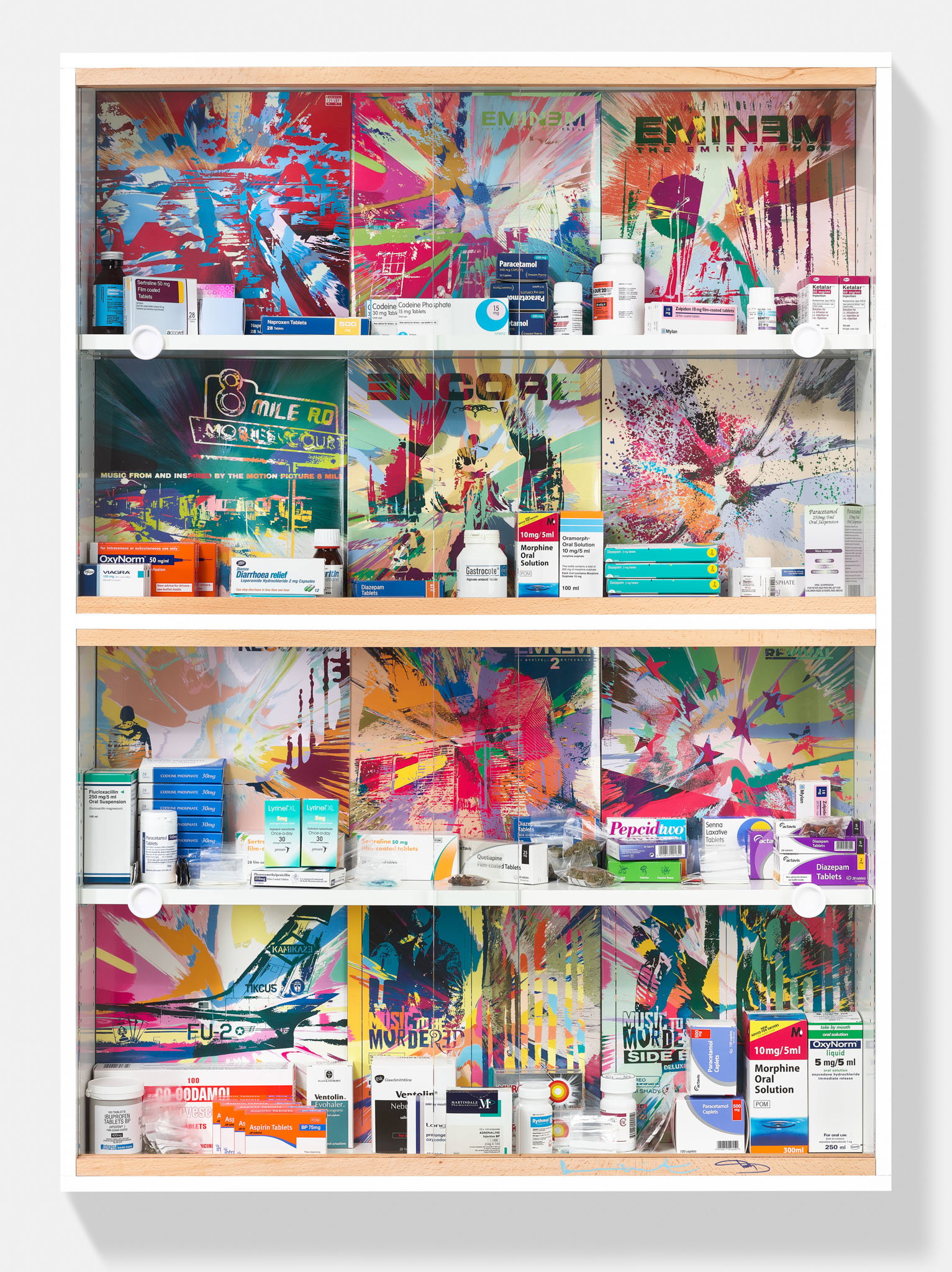 Damien Hirst and Eminem's Addict cabinet: Eminem album covers behind shelves of prescription drug boxes including Diazepam and morphine