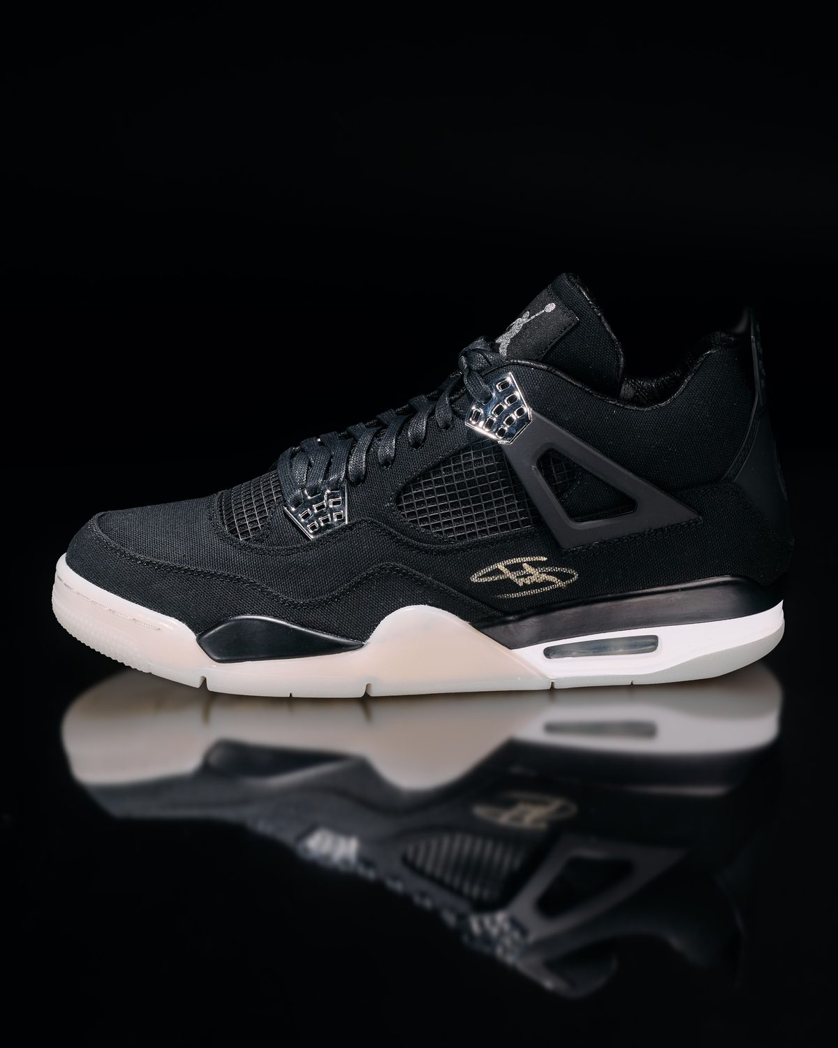 Carhartt × Air Jordan 4 promo — two pairs, $16,000 each